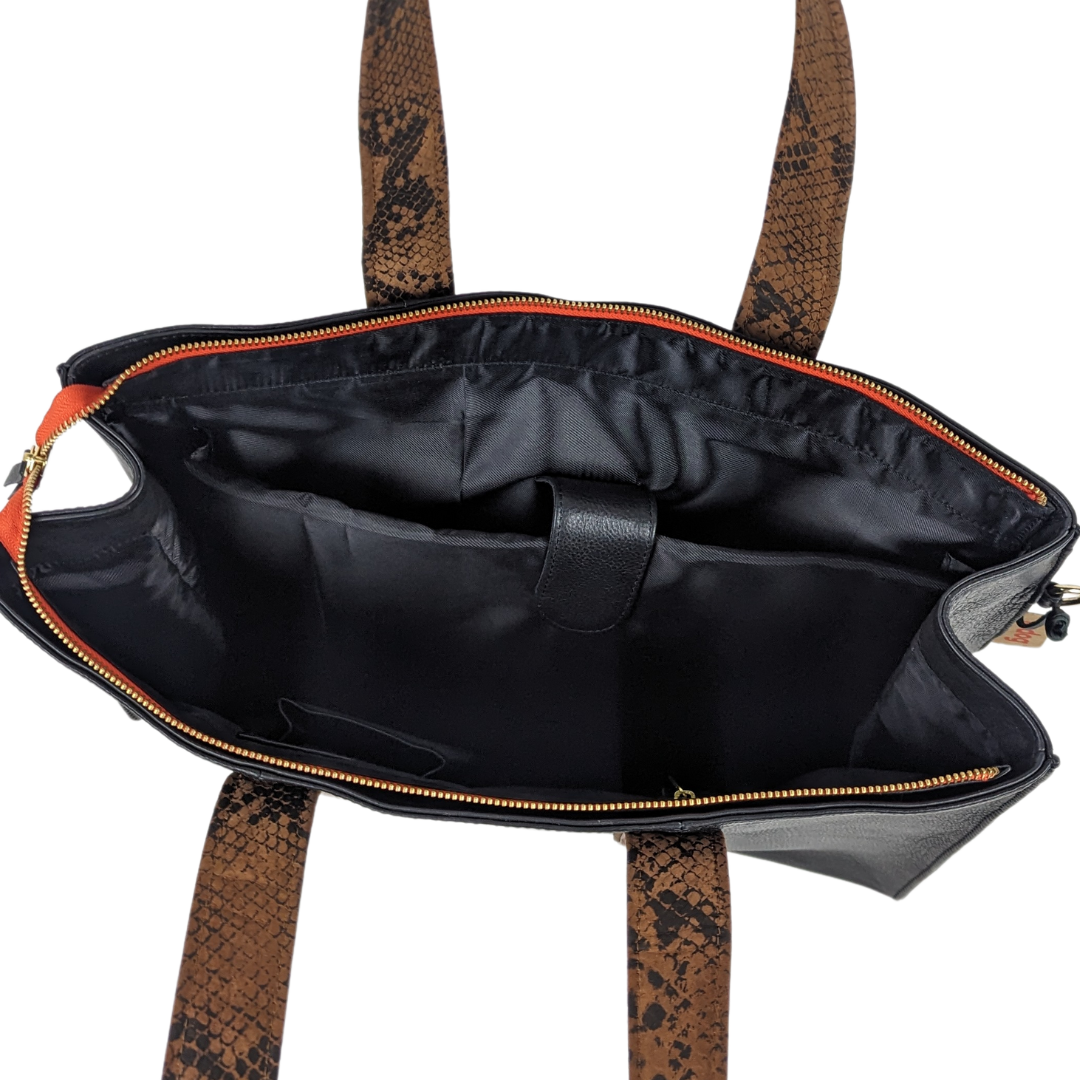 Image of Le Boss Bag by Le Dog Company's interior including a padded laptop sleeve.