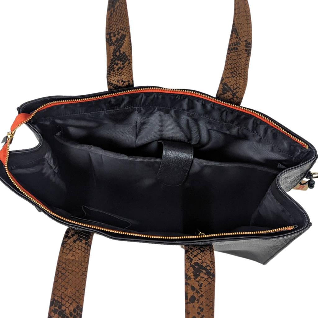 Image of Le Boss Bag by Le Dog Company's interior including a padded laptop sleeve.