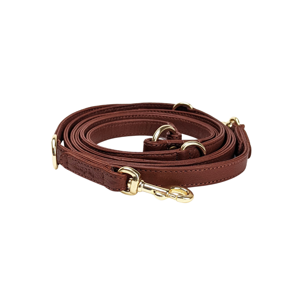 Cognac leather longline hands-free dog walking leash. Completely customizable for the best dog walks.