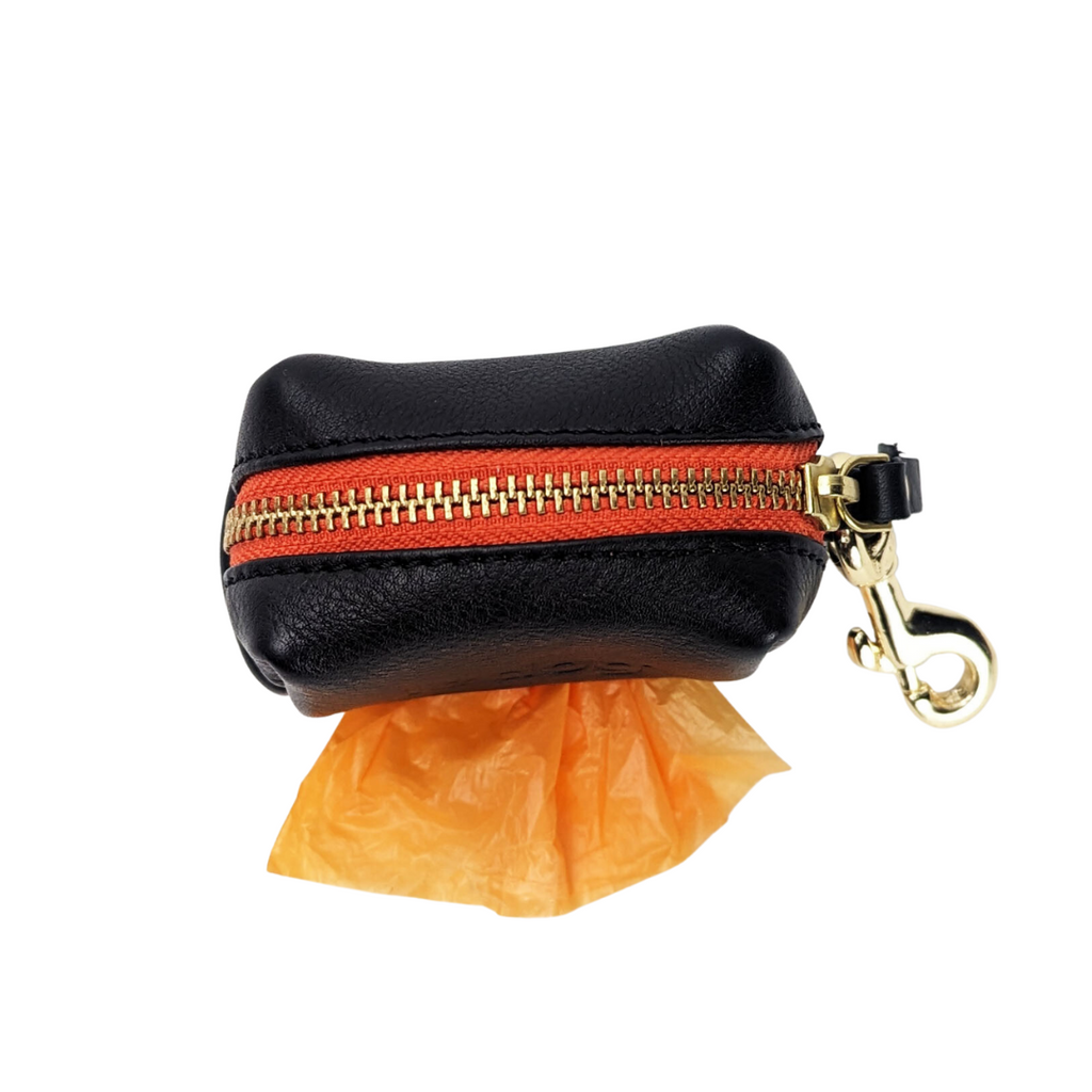 Leather poop bag holder from top with orange zipper in black from Le Dog Company