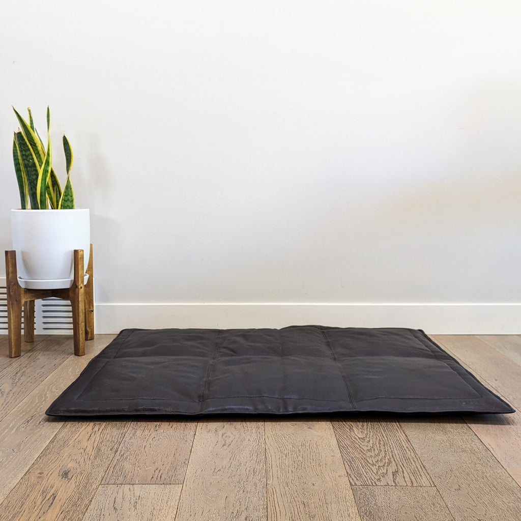 Le Dog Company leather dog mat that is portable, easy to clean and stylish.